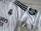 Dziecięcy zestaw piłkarski REAL MADRYT Home 25/26 Adidas (koszulka, spodenki i getry) Mbappe roz. 145-155cm