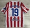 Dziecięcy zestaw piłkarski ATLETICO MADRYT Home 25/26 Nike (koszulka, spodenki i getry) J.Alvarez roz. 135-145cm