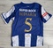 Dziecięcy zestaw piłkarski FC PORTO Home 25/26 New Balance (koszulka+spodenki+getry) #5 Bednarek