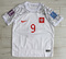 Dziecięcy zestaw piłkarski POLSKA NIKE Home World Cup 2022 #9 Lewandowski roz. 115-125cm