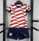 Dziecięcy zestaw piłkarski USA Home World Cup 2026 NIKE (koszulka+spodenki)