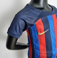 Dziecięcy zestaw piłkarski FC BARCELONA home 22/23 Nike (koszulka+spodenki)