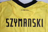 Koszulka piłkarska AEK Ateny Home 22/23 NIKE #4 Szymański