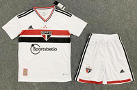 Dziecięcy zestaw piłkarski SAO PAULO home 22/23 Adidas (koszulka+spodenki)