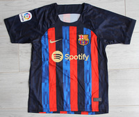Dziecięcy zestaw piłkarski FC BARCELONA NIKE Home 22/23 (koszulka+spodenki+getry) #9 Lewandowski