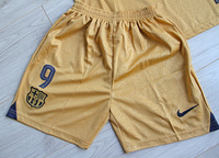 Dziecięcy zestaw piłkarski FC BARCELONA NIKE Away 22/23 (koszulka+spodenki+getry) #9 Lewandowski