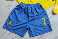 Dziecięcy zestaw piłkarski Al-Nassr home 23/24 Nike (koszulka+spodenki+getry) #7 Ronaldo