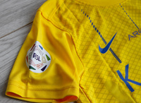 Dziecięcy zestaw piłkarski Al-Nassr home 23/24 Nike (koszulka+spodenki+getry) #7 Ronaldo