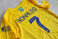 Dziecięcy zestaw piłkarski Al-Nassr home 23/24 Nike (koszulka+spodenki+getry) #7 Ronaldo