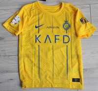 Dziecięcy zestaw piłkarski Al-Nassr home 23/24 Nike (koszulka+spodenki+getry) #7 Ronaldo