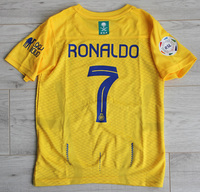 Dziecięcy zestaw piłkarski Al-Nassr home 23/24 Nike (koszulka+spodenki+getry) #7 Ronaldo