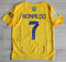 Dziecięcy zestaw piłkarski Al-Nassr home 23/24 Nike (koszulka+spodenki+getry) #7 Ronaldo