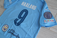 Dziecięcy zestaw piłkarski MANCHESTER CITY home 23/24 PUMA (koszulka+spodenki+getry) #9 Haaland