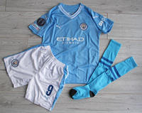 Dziecięcy zestaw piłkarski MANCHESTER CITY home 23/24 PUMA (koszulka+spodenki+getry) #9 Haaland