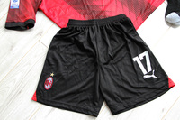 Dziecięcy zestaw piłkarski AC MILAN Home 23/24 PUMA (koszulka+spodenki+getry)