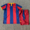 Dziecięcy zestaw piłkarski FC Barcelona home RETRO 10/11 Nike (koszulka+spodenki) #10 Messi