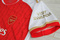 Dziecięcy zestaw piłkarski ARSENAL LONDYN Home 23/24 ADIDAS (koszulka+spodenki+getry) #15 Kiwior